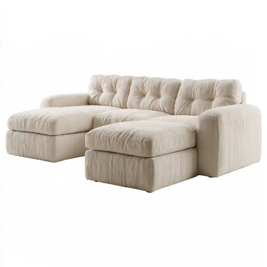 Divano beige con due sedute allungate e rivestimento a coste